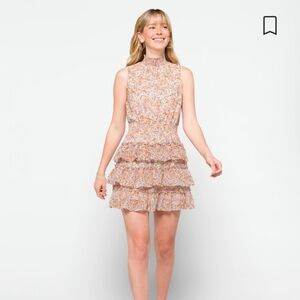 Sleeveless smocked neck ruffle dress